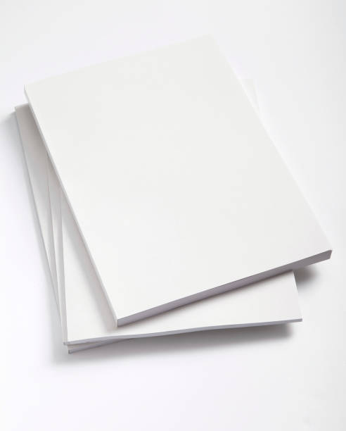 blanco portada de revistas - paperback book stack white fotografías e imágenes de stock