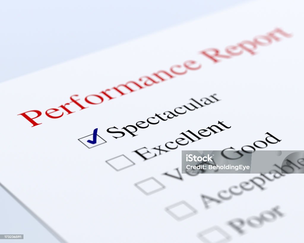 Performance Report XL Spectacular performance. Very shallow DOF, focus on part of "Spectacular". Examining Stock Photo