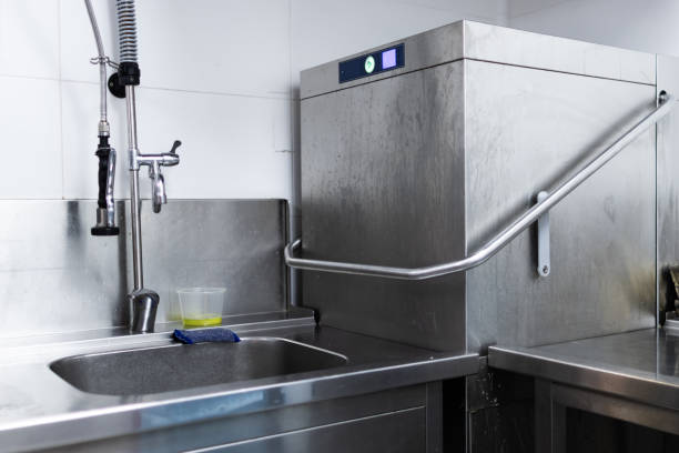 istock Industrial dishwasher in a restaurant kitchen washing dishes 1732376325