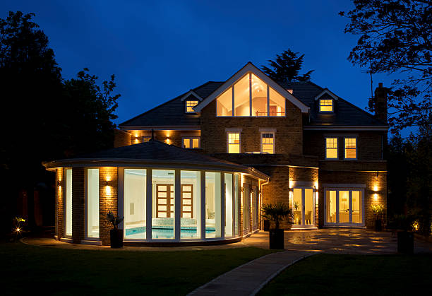 istock luxury house with pool at dusk 173239557