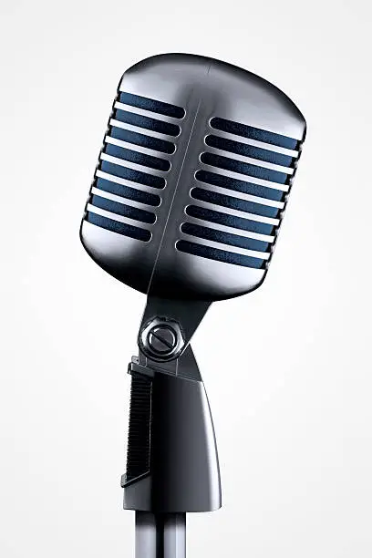 Retro microphone with clipping path on white background.