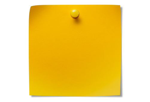 Notepaper attached by push pin, with clipping path.