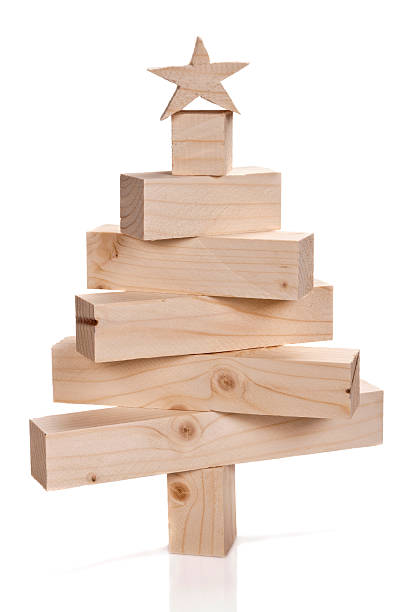 Stacked lumbers in the shape of a christmas tree