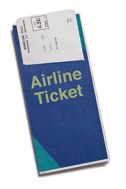 Airline Ticket Boarding passes in a generic airline ticket folder. boarding pass stock pictures, royalty-free photos & images