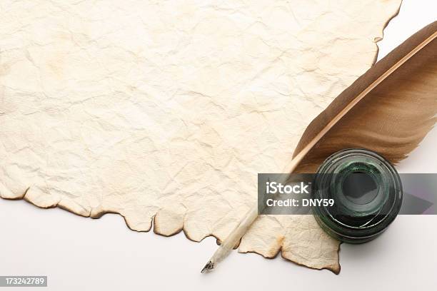 Quill And Inkwell On Top Of Old Blank Document Stock Photo - Download Image Now - Quill Pen, Ink, Feather