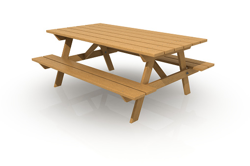 Wooden picnic table on a white background.