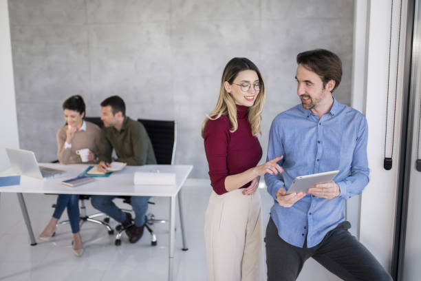 istock Happy business partners creating new ideas in the office. 1732430989