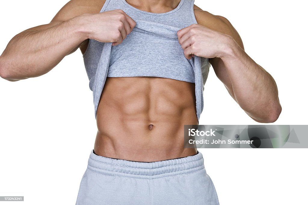 Uomo, mostrando il suo abs - Foto stock royalty-free di Muscolo addominale