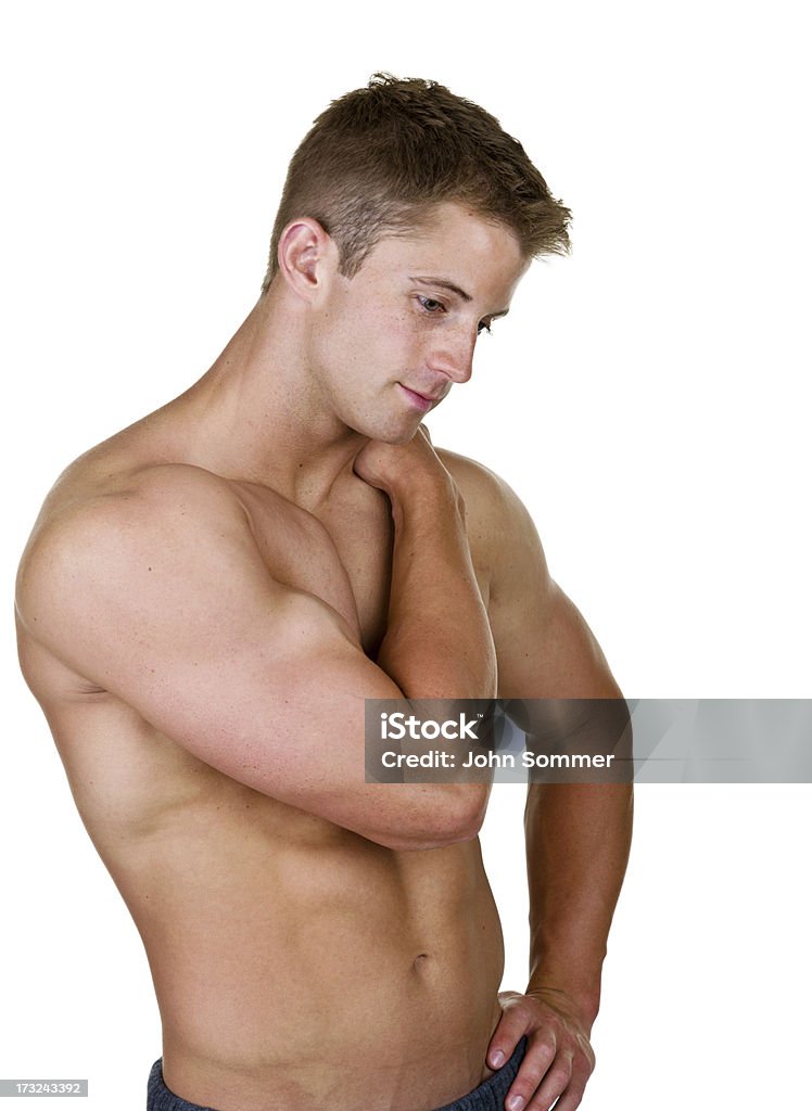 Muscolare uomo con dolori e indolenzimenti; - Foto stock royalty-free di Persona di sesso maschile