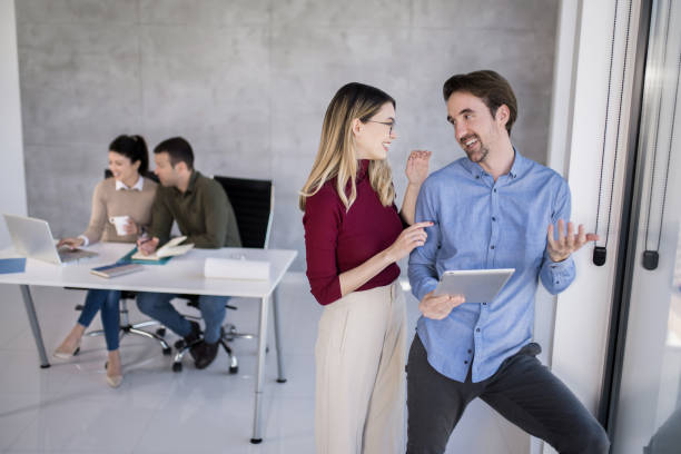 istock Happy business partners creating new ideas in the office. 1732435245