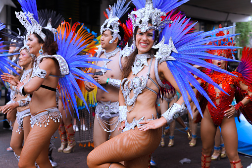 Ladbroke Grove, London, England – August 28, 2023: Carnival Attendees at The final day of 2023’s Notting Hill Carnival on a sunny afternoon.