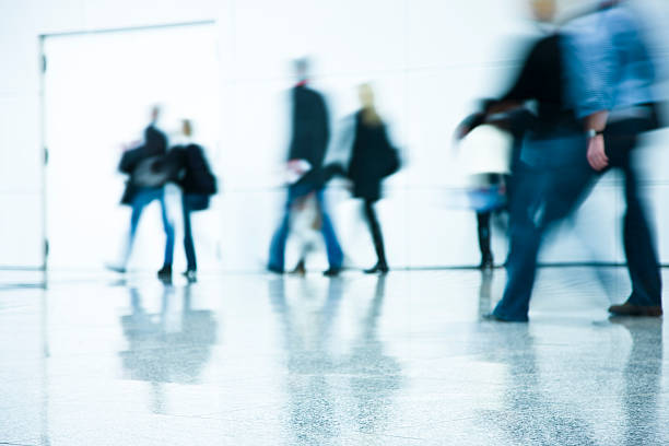 istock Motion Blurred People Walking Indoors 173245403