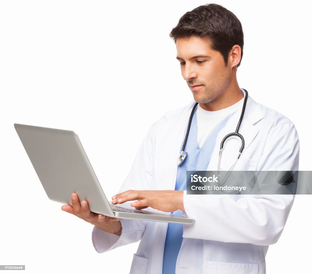Homme médecin à l'aide d'un ordinateur portable-isolé - Photo de Docteur libre de droits