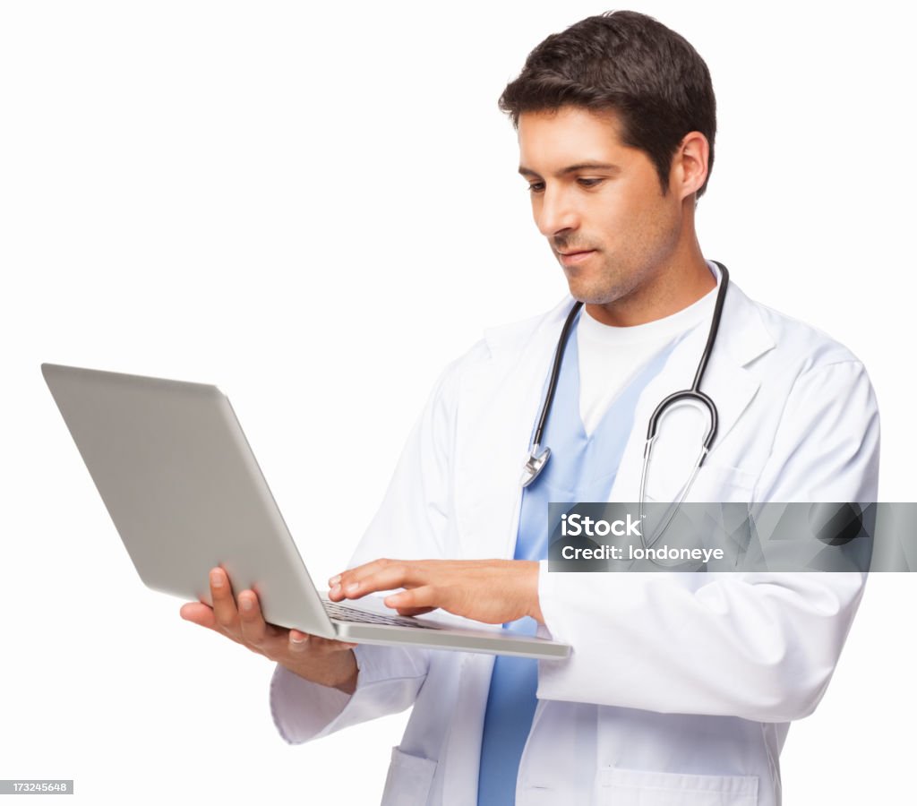 Maschio medico utilizzando computer portatile isolato - Foto stock royalty-free di Medico