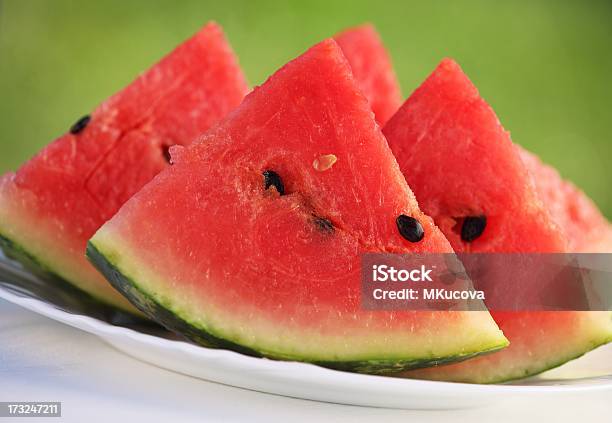 Portrait Of Watermelon Slices On A White Plate Stock Photo - Download Image Now - Food, Food and Drink, Fruit