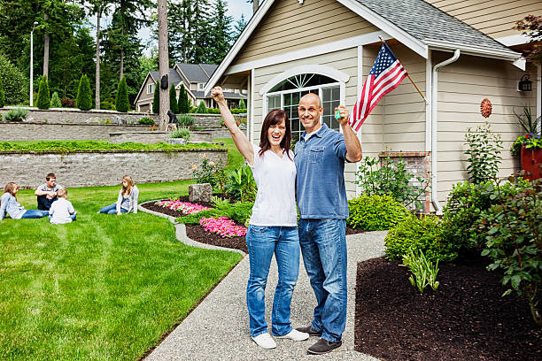 istock Happy Family with New Home 173250164