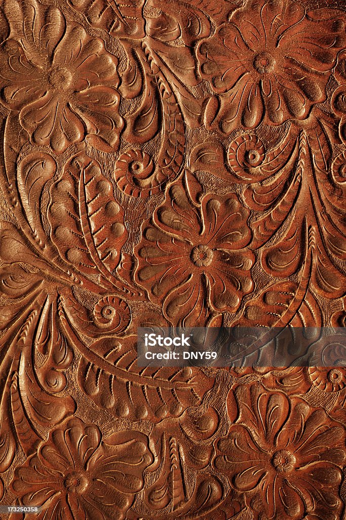 Tooled Leather Close up of hand tooled leather Leather Stock Photo