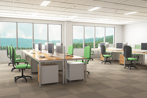 A large, open office area with floor-to-ceiling windows on the far wall looking out over forested hillside.  The floor is brown with a checkerboard pattern.  There are two long, rectangular wooden tables, each with six light green chairs around them.  In front of each chair is a flat computer screen, a keyboard, a mouse and a computer under the desk.\n[url=stock-photo-26491647-contemporary-conference-room.php][img]http://i.istockimg.com/filethumbviewapprove/26491647/2/stock-photo-26491647-contemporary-conference-room.jpg[/img][/url][align=center][url=file_search.php?action=file&lightboxID=8069960][img]http://www.evirgendesign.com/istock/buttons/interiors.jpg[/img][/url]