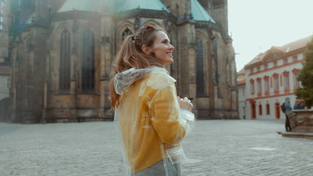happy stylish woman in Prague Czech Republic having excursion