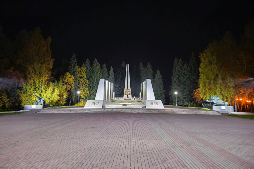 Gorno-Altaysk, Russia - October, 07, 2023: Victory Park Memorial Complex in Gorno Altaysk. Night view.