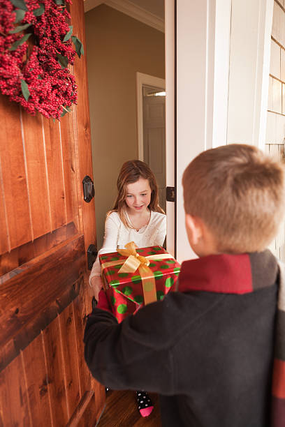 istock Boy Visitor with Surprise Christmas Gift 173253456