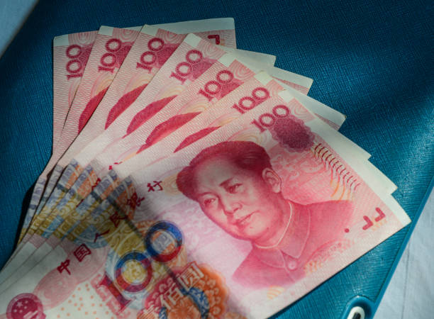 100 Renminbi (RMB) banknotes 100 Renminbi (RMB) banknotes closed up. mao original stock pictures, royalty-free photos & images