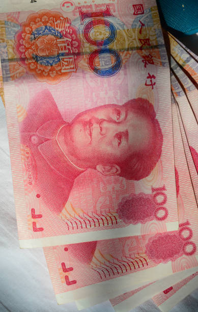 100 Renminbi (RMB) banknotes 100 Renminbi (RMB) banknotes closed up. mao original stock pictures, royalty-free photos & images