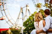 Loving couple in front of Vienna Prater