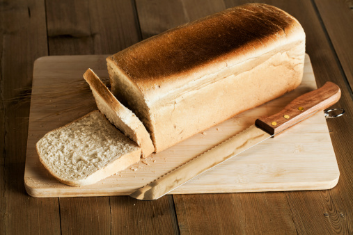 Loaf of bread on wooden table