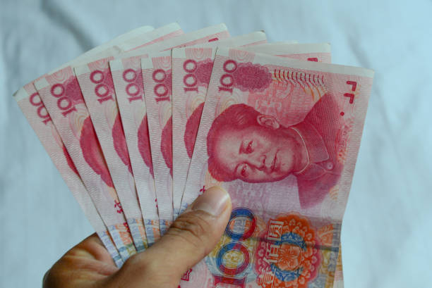 100 Renminbi (RMB) banknotes Renminbi (RMB) banknotes Chinese currency. mao original stock pictures, royalty-free photos & images