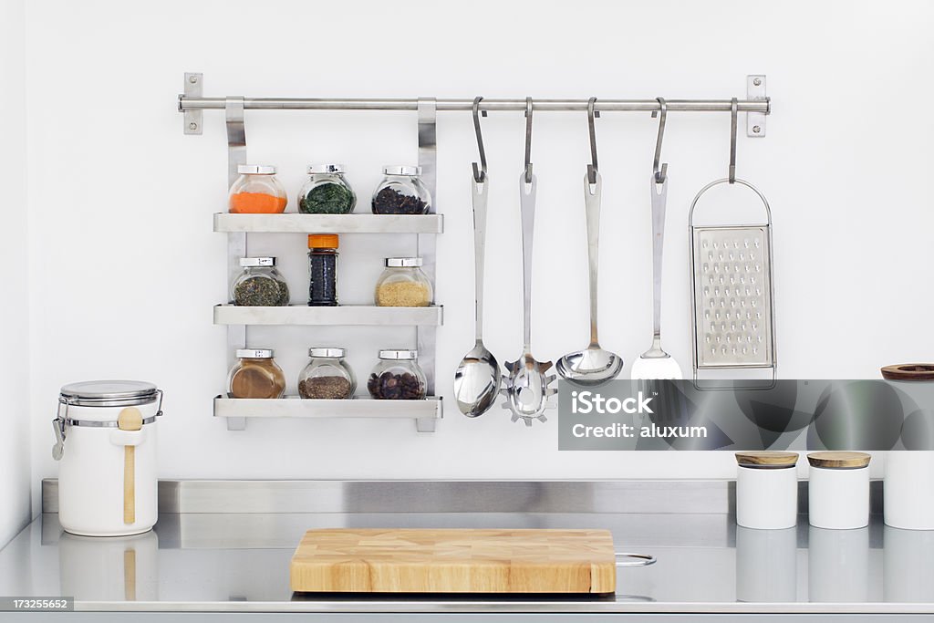 Modern kitchen Kitchen utensils and spices in bowls in stainless steel kitchen Kitchen Stock Photo