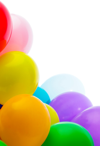 Multicolored balloons on white background