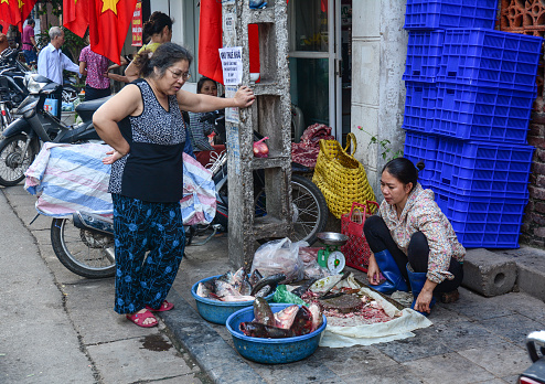 Hanoi, Vietnam - Oct 31, 2015. Street market at Old Quarter of Hanoi, Vietnam. Hanoi is one of the most ancient capitals in the world.