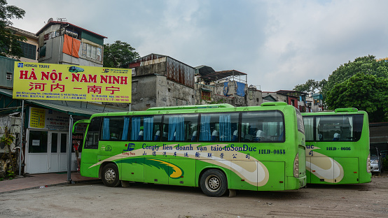 Hanoi, Vietnam - Oct 31, 2015. Long-distance bus station in Hanoi, Vietnam. Hanoi is one of the cities with very chaotic traffic conditions.