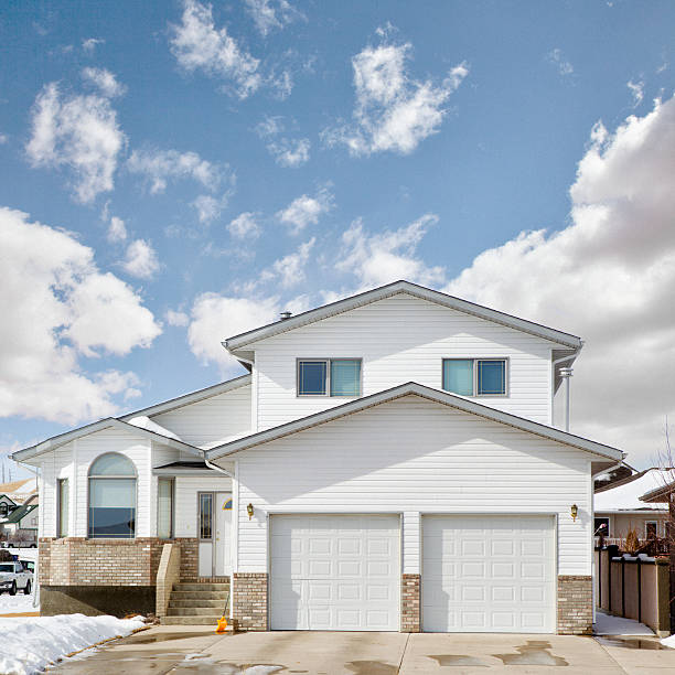 Two story single family home with attached garage. 2 files stitched.