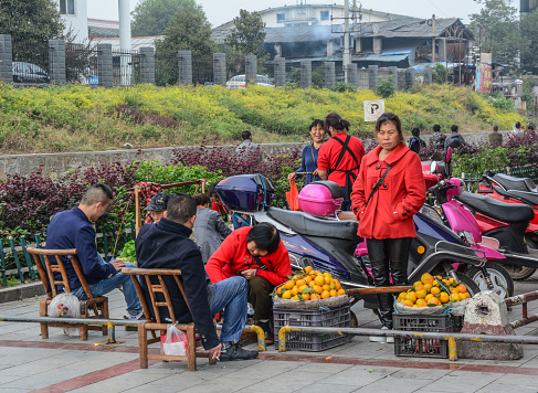 Hunan, China - Nov 5, 2015. Vendors on street at Fenghuang Ancient Town in Hunan, China.