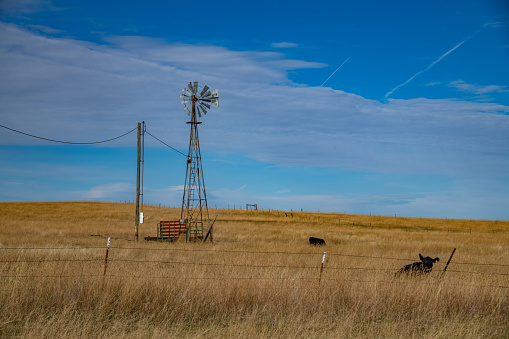 Old and broken windmill on Montana ranch land in western USA of North America, Nearest cities are Bozeman and Billings, Montana.