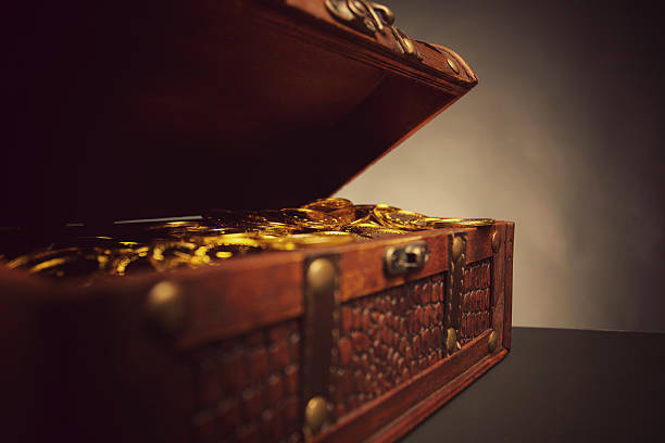 istock treasure chest full of gold 173260533