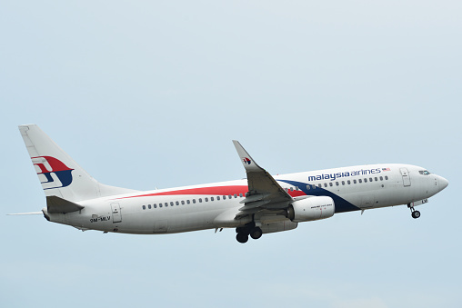 Phuket, Thailand - Apr 25, 2018. A Boeing 737-800 airplane of Malaysia Airlines taking off from Phuket Airport (HKT).