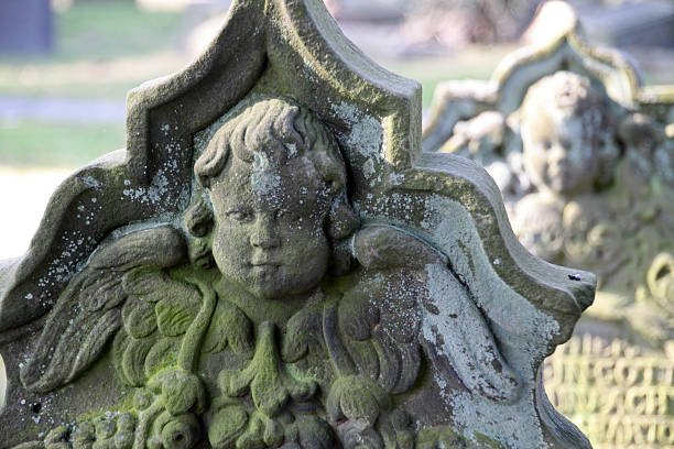 istock Old grave stone with angel 173261836