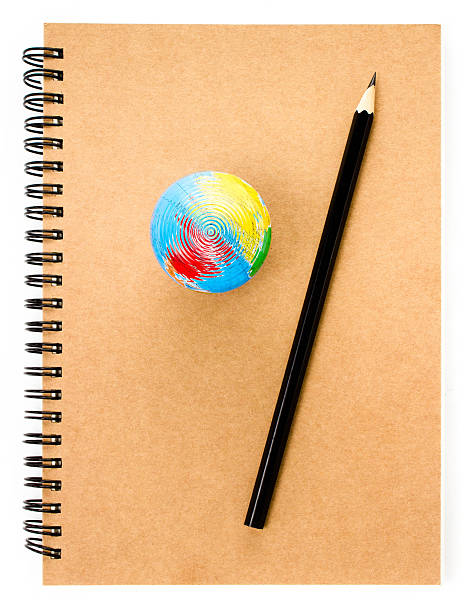 istock School Globe and recycle craft  notebook  on white background. 173262036