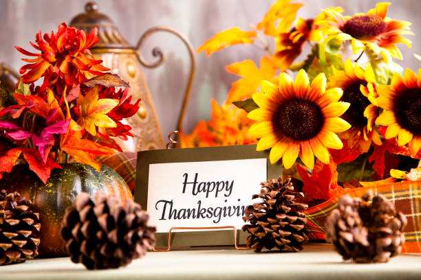 istock Happy Thanksgiving place setting. Centerpiece, flowers. 173262104