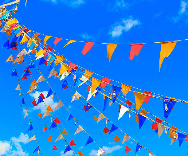 istock Multi color bunting flags reaching up to the sky 173263879