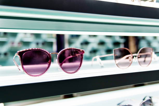 Sunglasses on shelves in a store