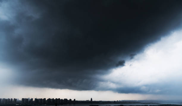 Free Stock Photo of Dark storm clouds over a silhouetted landscape at ...