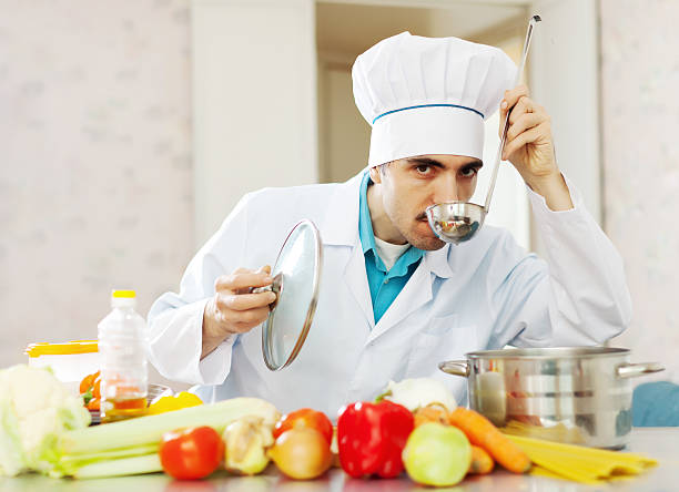 istock Caucasian male chef tasting soup 173273304