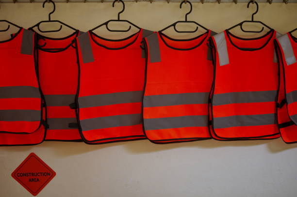 istock Reflective vests hanging on the wall 1732756903