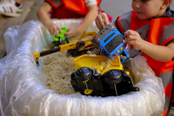 istock Toddlers playing in sand 1732756907