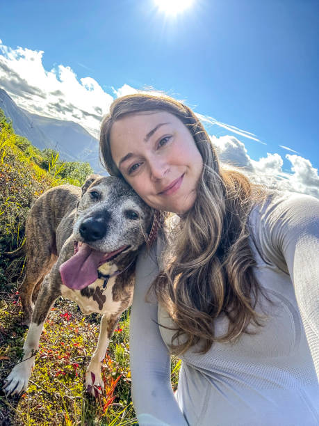 istock Selfie-Woman and her Dog 1732795393