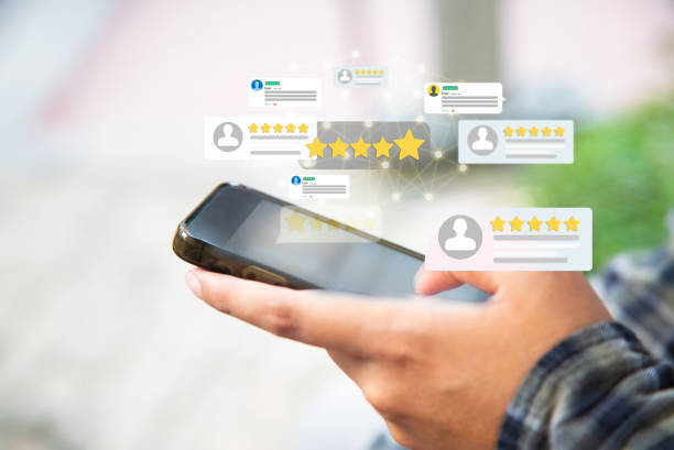 istock customer feedback,experience,review concept.Hands holding mobile phone 1732805161